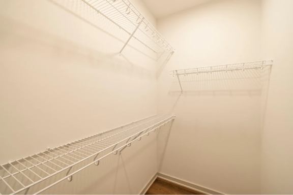 Empty shelves in a white room.