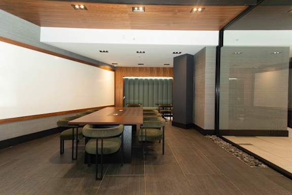 Conference room with upholstered seating and wood ceiling at 1134 Fulton Street Apartments, Brooklyn, 11216