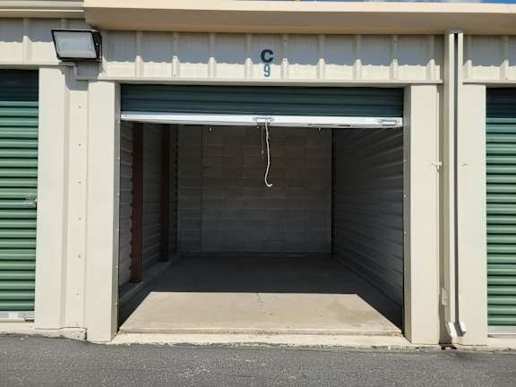 A storage unit with the number C9 is open for business.