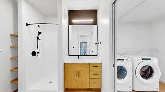 A laundry room with a washer and dryer.