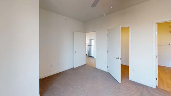 an empty room with walls and doors in it