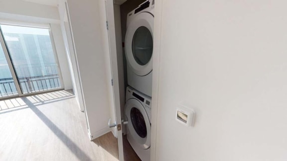 a washer and dryer inside of a door
