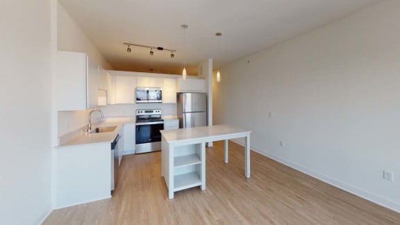 a kitchen with a counter top and a sink