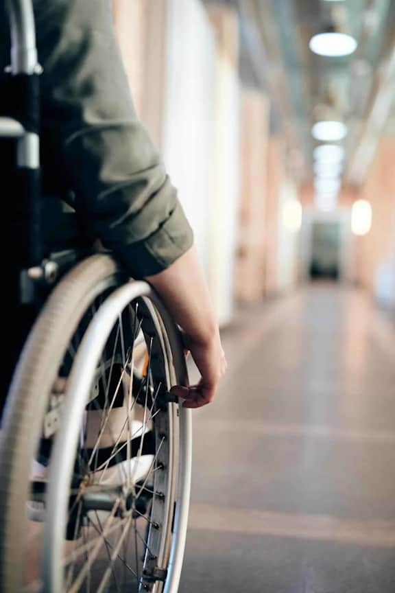 a person sitting in a wheelchair