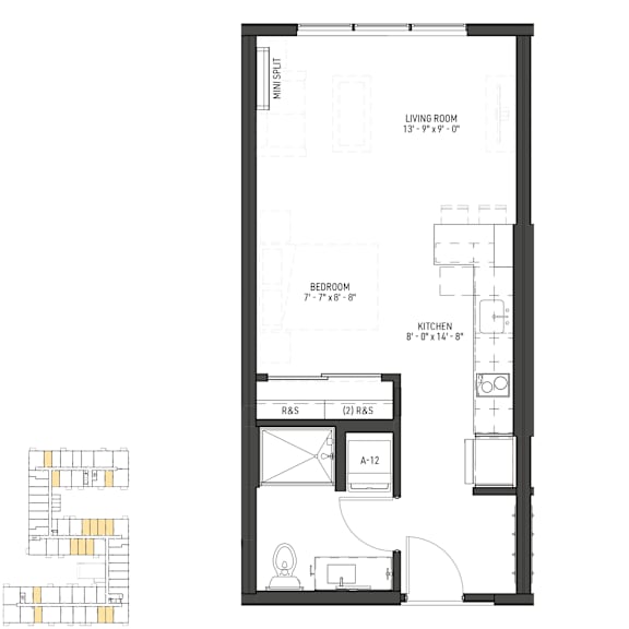 A floor plan of a house with a living room, bedroom, and kitchen.