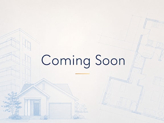 A house and blueprints with the words "Coming Soon" written on the image.