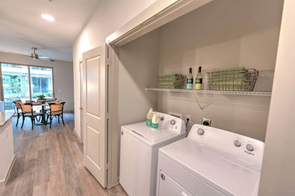 our apartments have a laundry room with a washer and dryer at The Pointe at Valley Ranch Town Center, New Caney