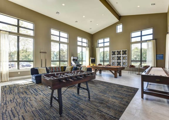 a games room with foosball and ping pong tables at The Pointe at Valley Ranch Town Center, Texas, 77357