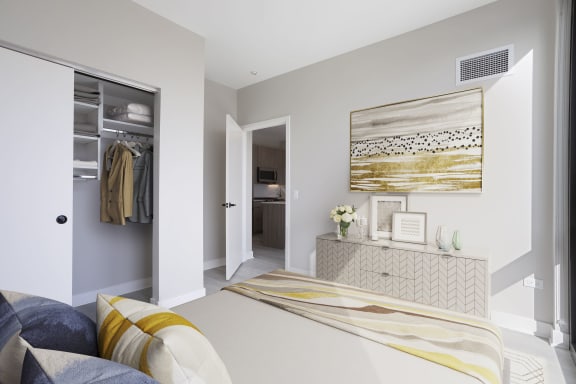 a bedroom with grey walls and a large bed at Platform 4611, Chicago