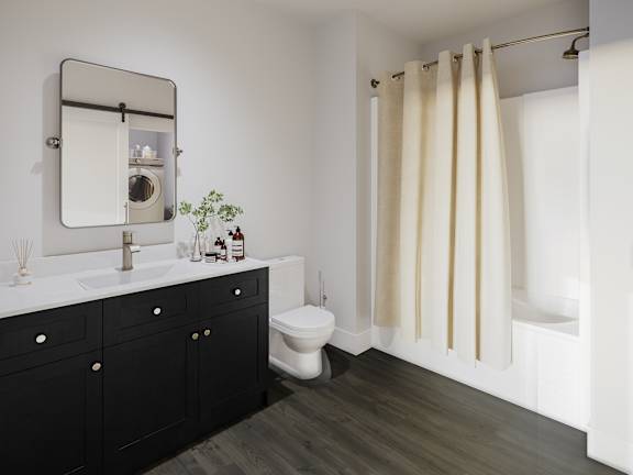 a bathroom with a toilet and a sink and a mirror