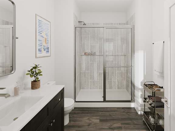 a bathroom with a shower and a sink and a toilet