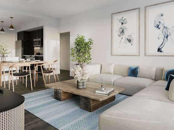 a living room with couches and a coffee table