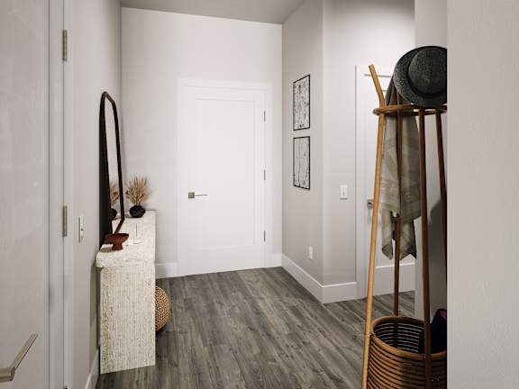 a hallway with a ladder and a white door