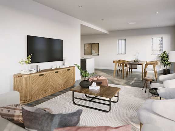 a living room and dining room with a tv and a table