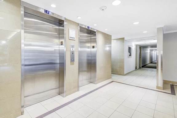 Two elevators in a lobby  at Platts Crossing, London, ON, N6H 4P4