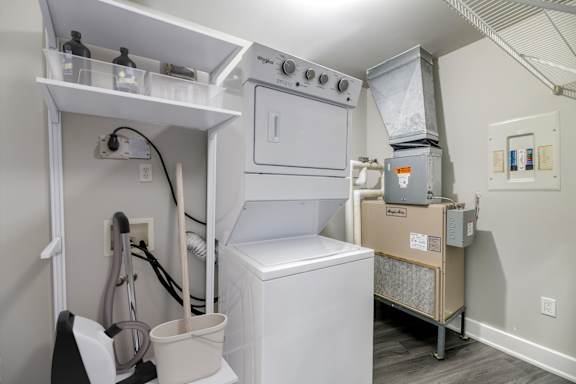 A laundry room with a washer and dryer.