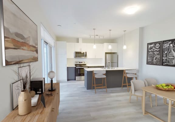 a kitchen and dining room with a table and chairs