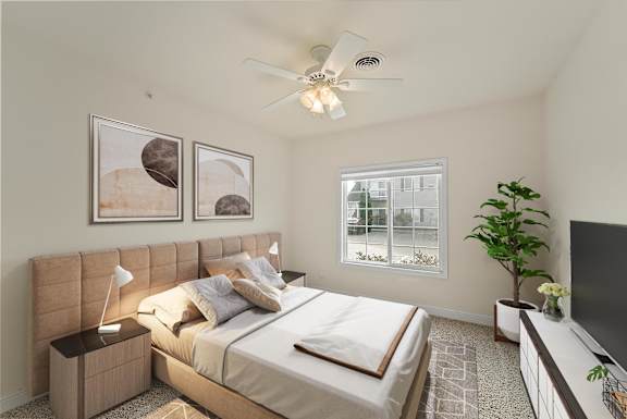 a bedroom with a large bed and a ceiling fan
