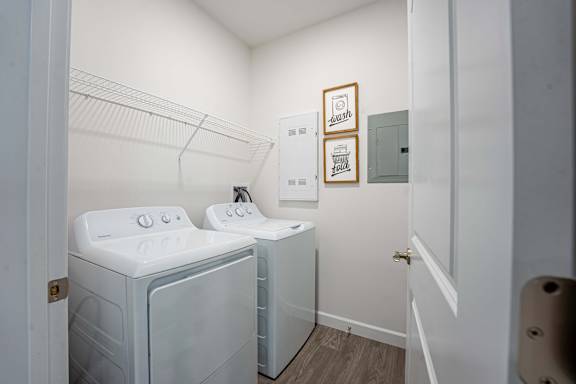 A laundry room with a washer and dryer.