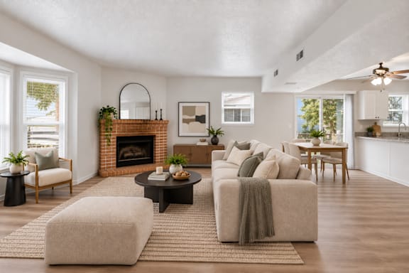 A living room with a fireplace and a couch.
