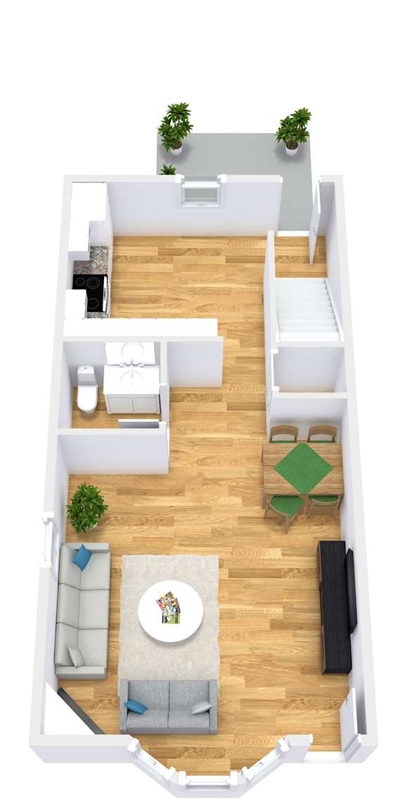 A top-down view of a living room with a couch, coffee table, and two potted plants.