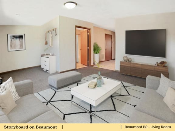 a living room with a couch and a table