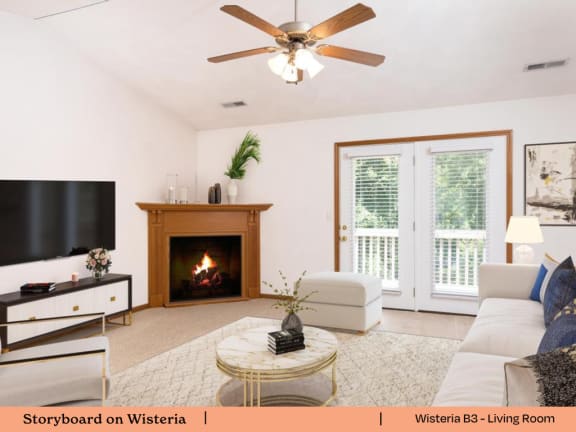 a living room with a couch and a tv and a fireplace