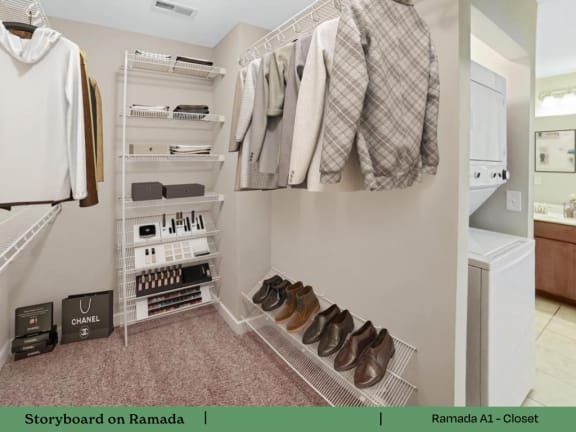 a walk in closet with a rack of clothes and shoes
