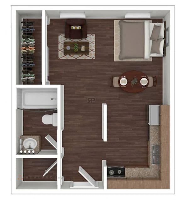 A top-down view of a room with a couch, coffee table, and a bed.