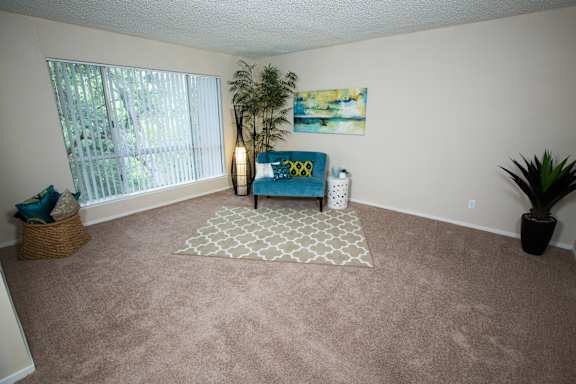 Model home living room at Abby Creek Apartments, Carmichael, CA