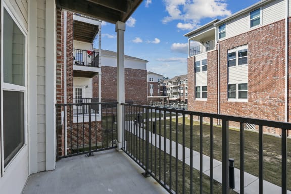 the spacious balcony with a view of The Loft apartment buildings in Slidell, LA