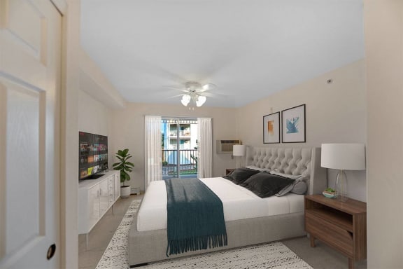 a bedroom with a bed and a ceiling fan