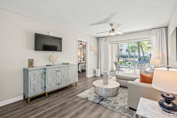 Living Room With TV at Coastline Apartments, Florida, 32547
