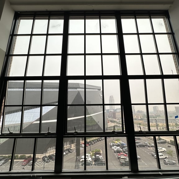 a large window overlooking a parking lot