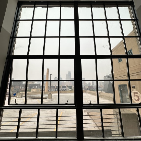 a view of the city from inside the building
