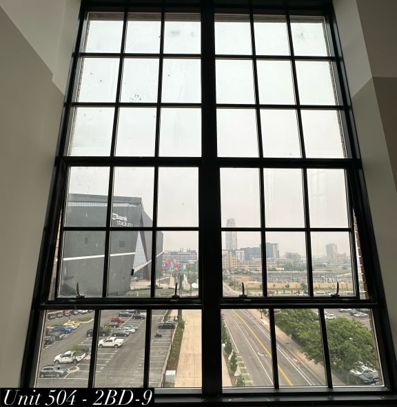 a large window with a view of a city