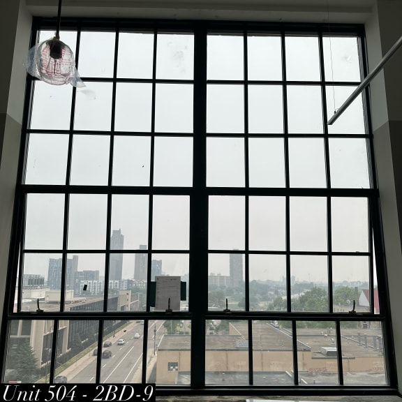 a large window with a view of a city