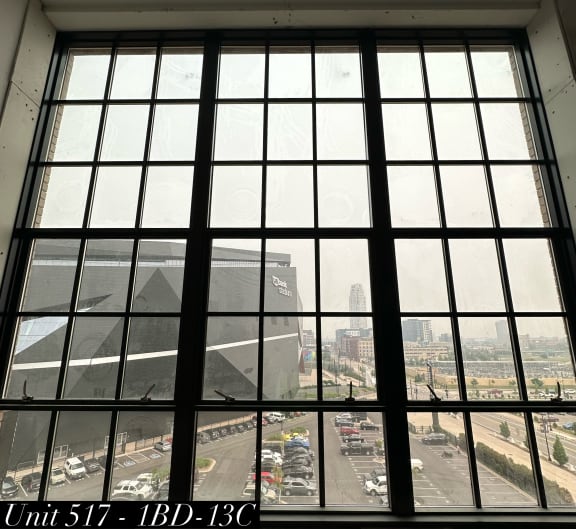 a large window with a view of a parking lot