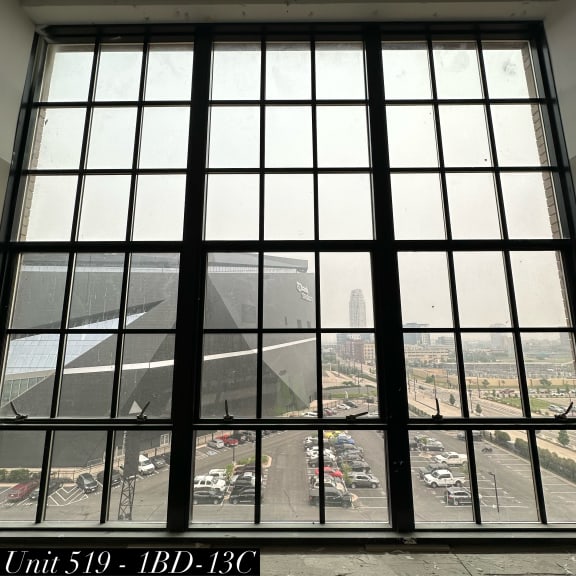a large window overlooking a parking lot