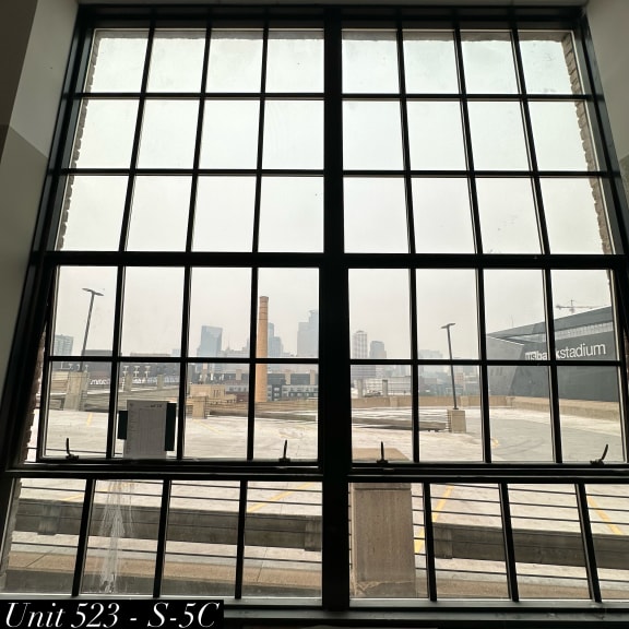 a view of the city from inside the building