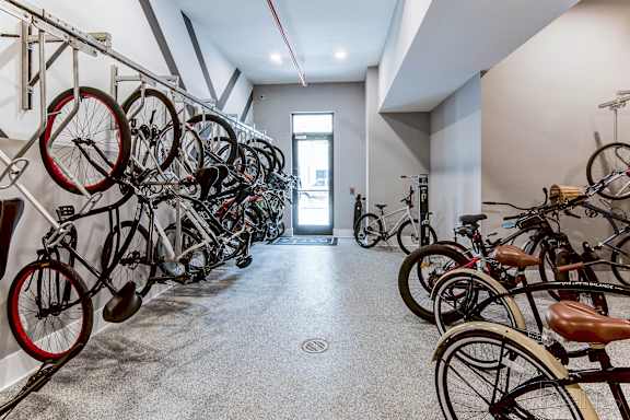 A bike rack with many bikes on it at Mayla Pompano, Pompano Beach, 33062