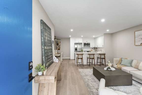 Living Room With Kitchen View at Tamarack Sands Apartment Homes, Carlsbad, CA, 92008