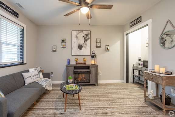 Living Area With Ceiling Fan at Lauradale, Jacksonville, NC
