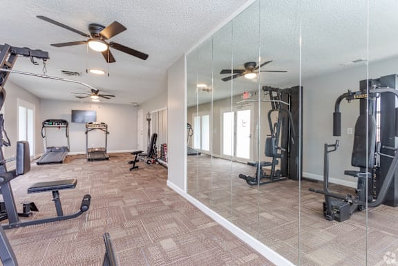 A spacious home gym with a variety of equipment.at Liberty Crossing, Jacksonville, 28540