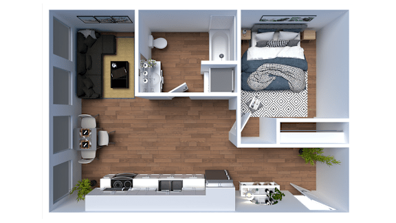 A top-down view of a small, neatly organized apartment with a bed, desk, and kitchenette.