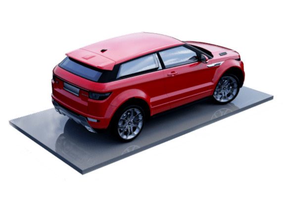 A red car is shown from the rear view on a grey platform.