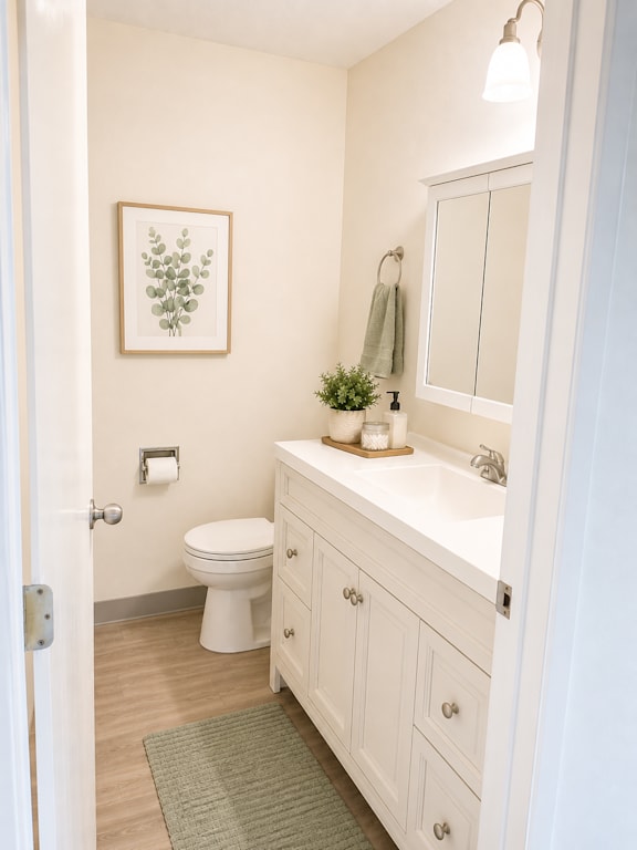 Bathroom with white vanity and modern fixtures at Laurel on 2nd Apartments, Oregon