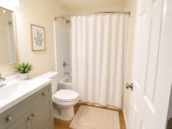 Full bathroom with tub shower combination at Laurel on 2nd Apartments, Oregon, 97132