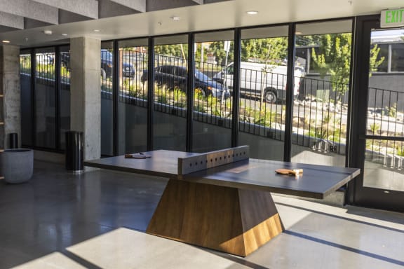 a ping pong table in the lobby of a building at Moraine, Tacoma, WA 98402