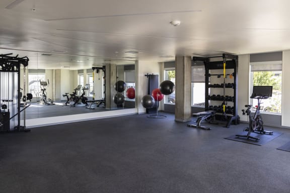the gym has weights and other equipment in it at Moraine, Tacoma, Washington 98402